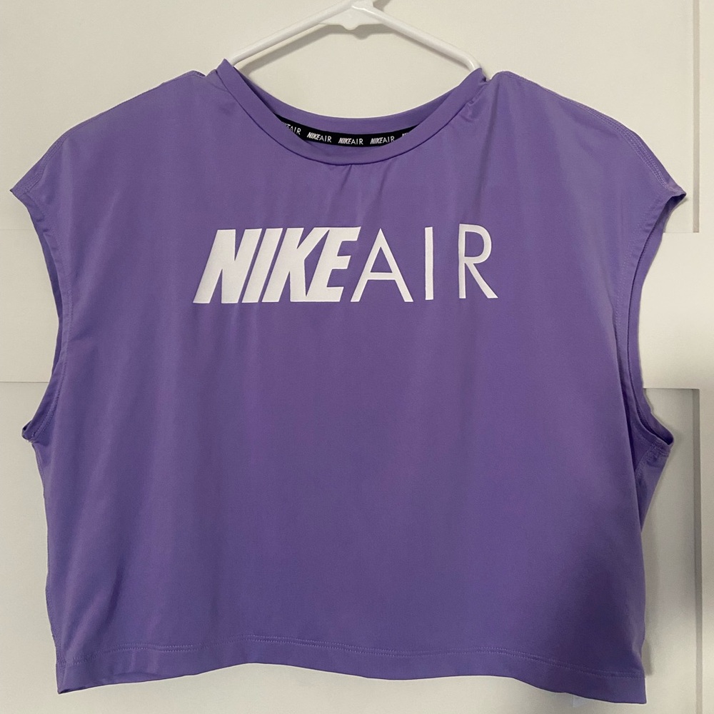 Purple Nike air dri-fit crop shirt, like new and was worn about twice.